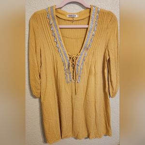 Mustard yellow tunic with mesh collar. Small